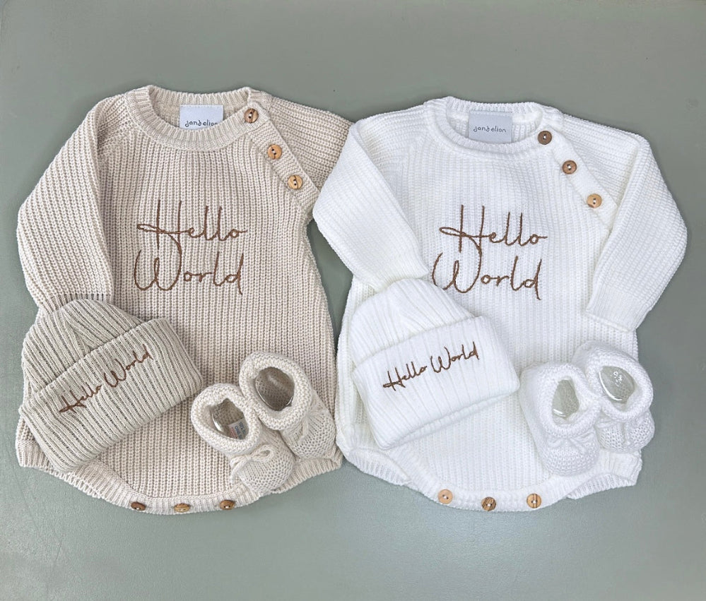 White and taupe ribbed knit baby romper with matching hat and embroidered Hello World design – Newborn to 0–3 Months