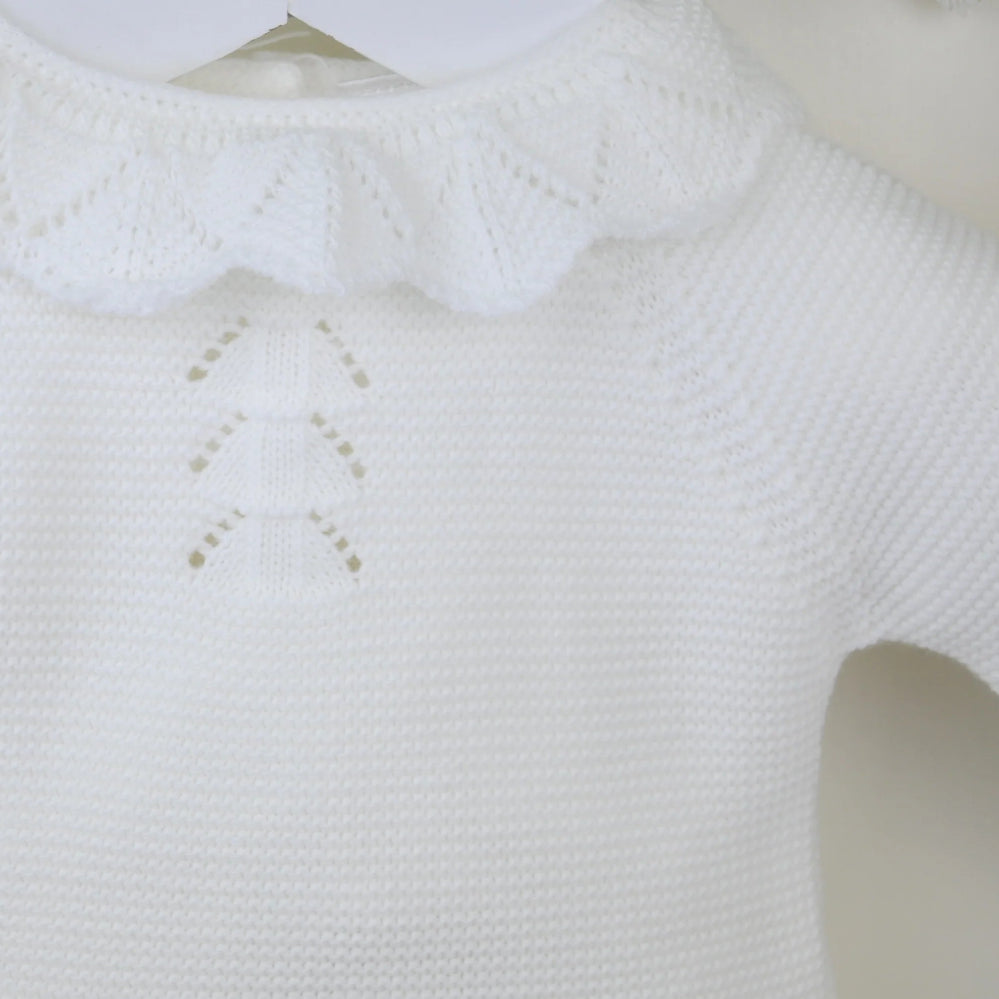 Pink 3-piece knitted baby outfit by Pex with bonnet, frill collar, and footed trousers – also available in white and beige