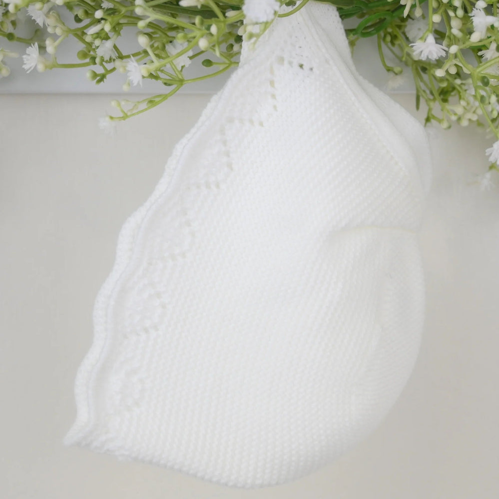 Pink 3-piece knitted baby outfit by Pex with bonnet, frill collar, and footed trousers – also available in white and beige