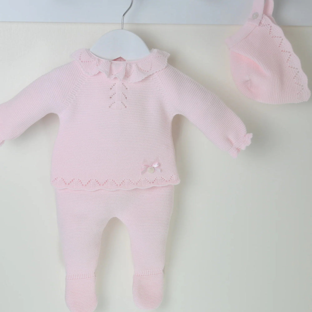 Pink 3-piece knitted baby outfit by Pex with bonnet, frill collar, and footed trousers – also available in white and beige