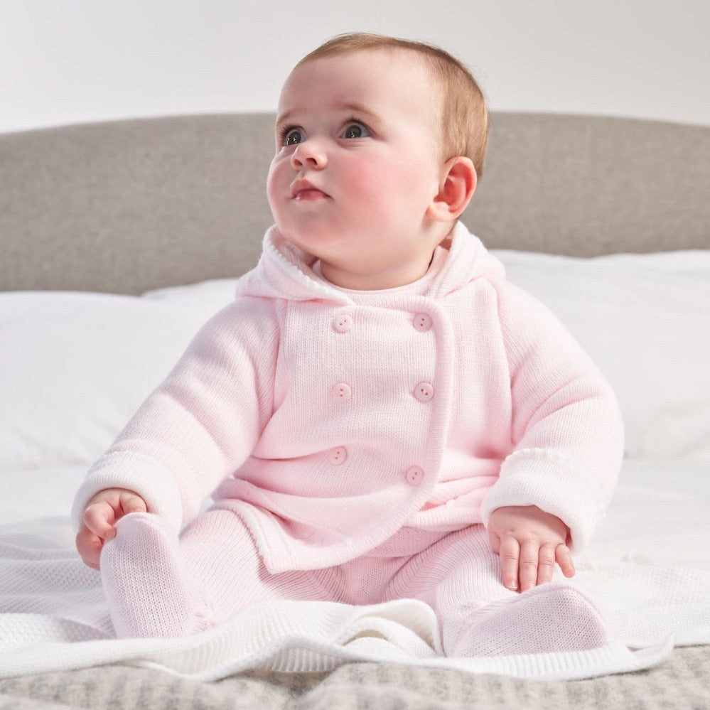 Pink knitted baby jacket with white lined hood and button front – newborn to 12 months