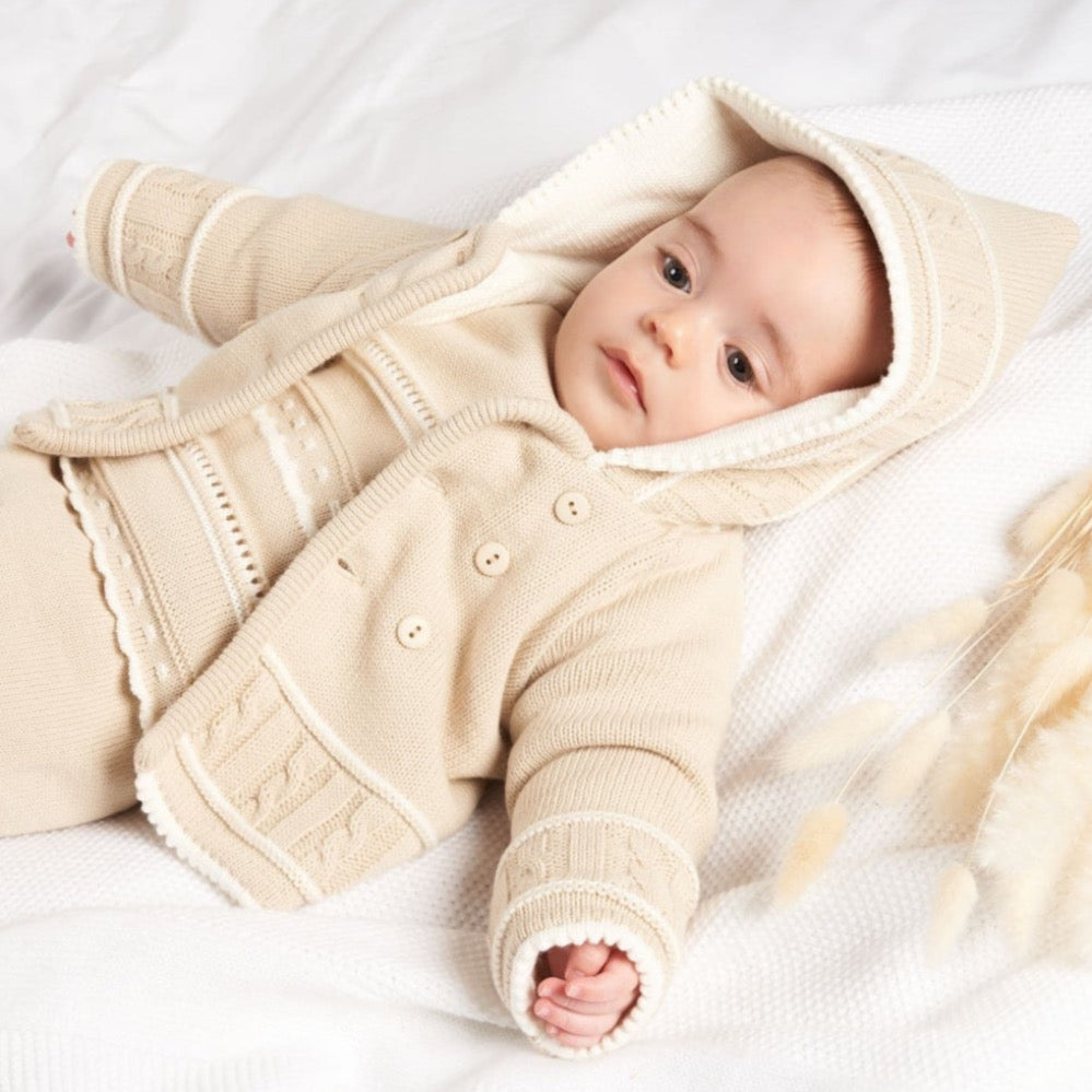 Taupe knitted baby jacket with white-lined hood and button front – cosy newborn outerwear