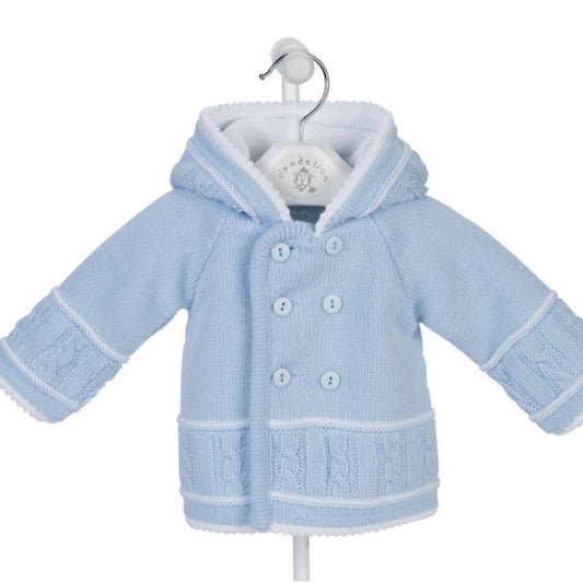 Blue knitted baby jacket with white hood lining and button front – warm and stylish outerwear for newborns to 12 months