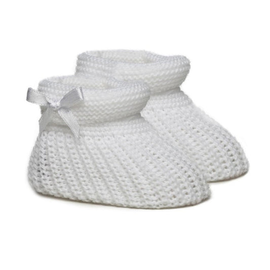 White knitted baby booties with elegant side bow – newborn size