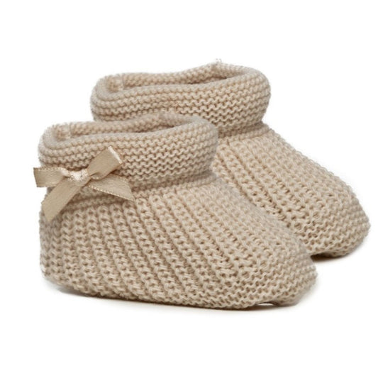 Taupe knitted baby booties with a delicate side bow – newborn size