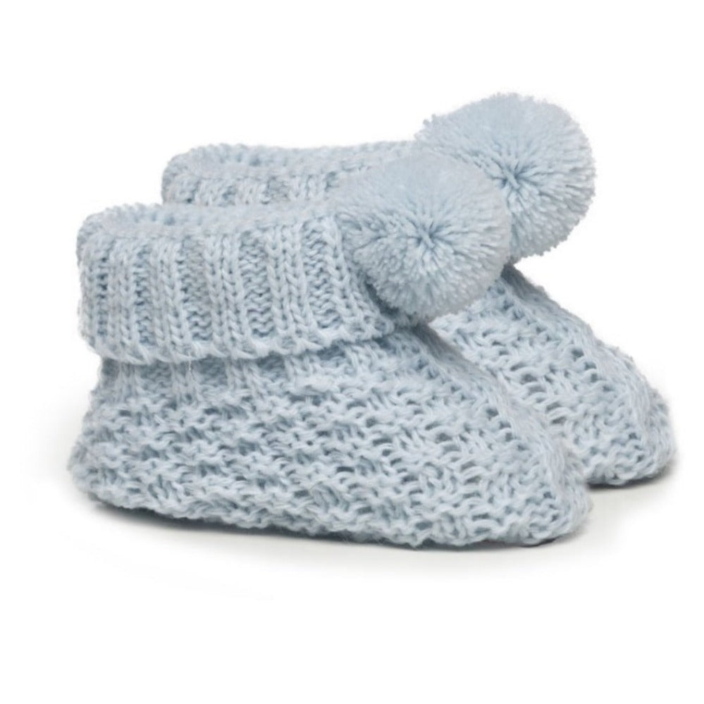 Sky blue knitted baby booties with soft pom pom detail – newborn size