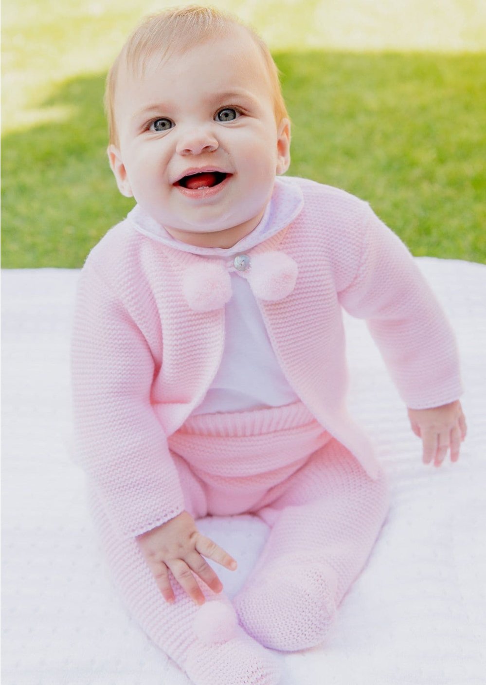 Dandelion pink knitted baby set with pompom jacket and matching leggings – perfect for newborns to 6 months