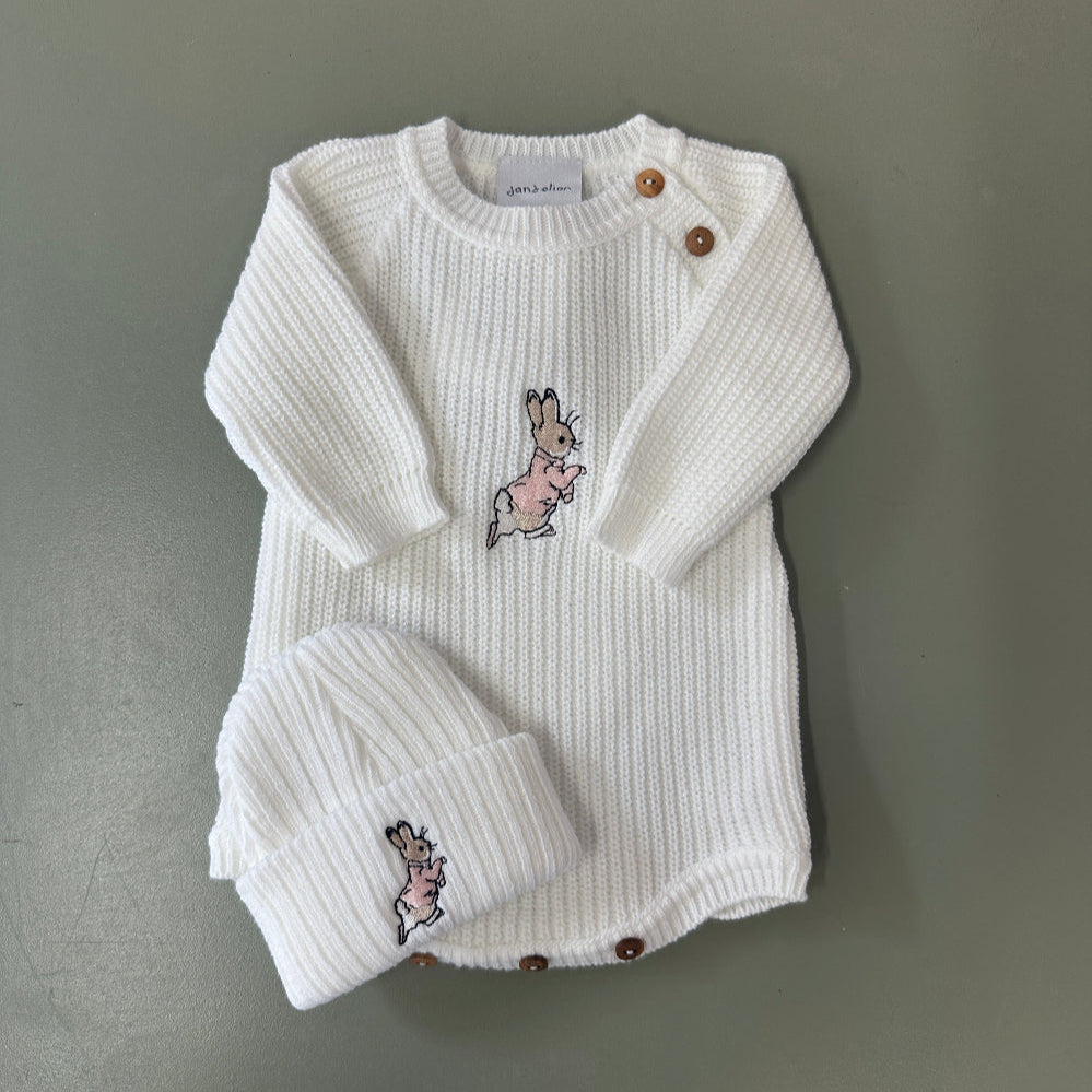 Pink and white ribbed knit baby romper with matching hat and embroidered running rabbit – newborn baby outfit