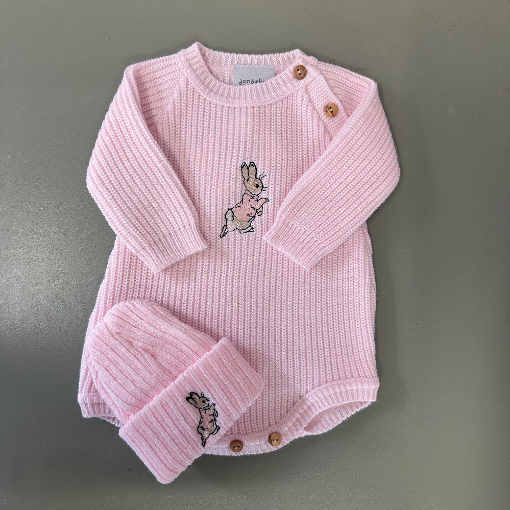 Pink and white ribbed knit baby romper with matching hat and embroidered running rabbit – newborn baby outfit