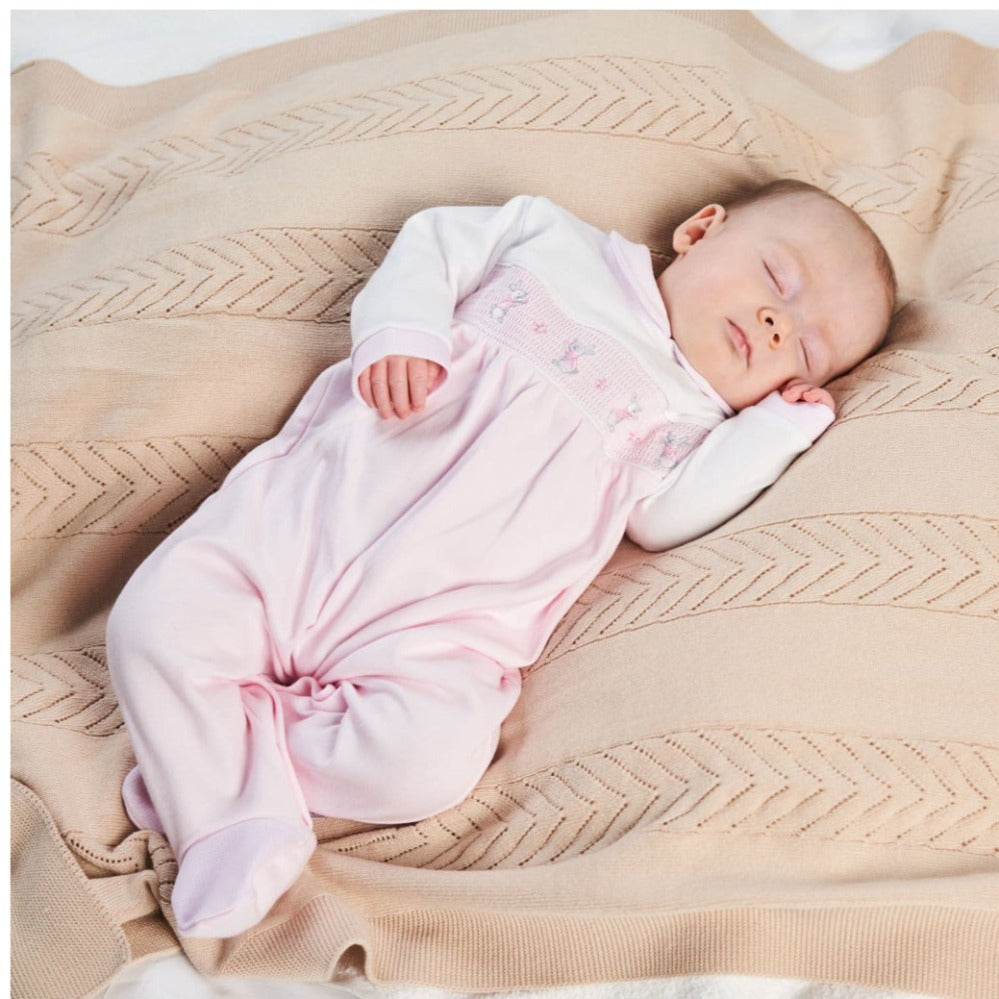 Pink smocked baby onesie with bunny and star detail and Peter Pan collar – Dandelion