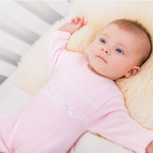Pink and white Dandelion girls’ knitted baby onesie with satin bow – Newborn to 6 Months