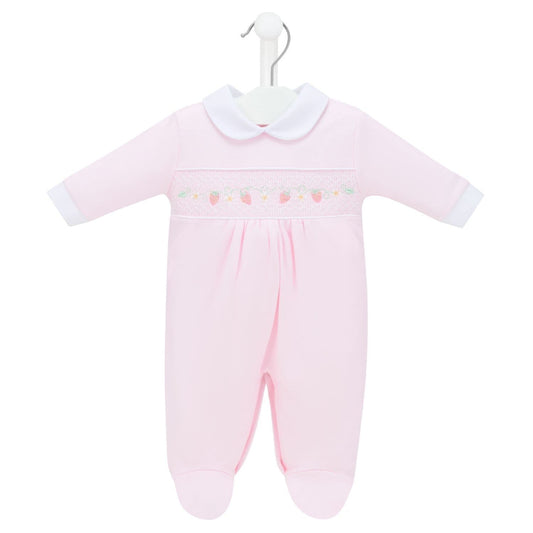 Pink baby onesie with white collar on a hanger against a white background