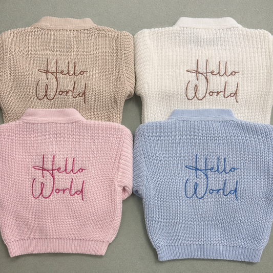 Dandelion Hello World Knitted Baby Cardigan (Newborn – 0–3 Months)