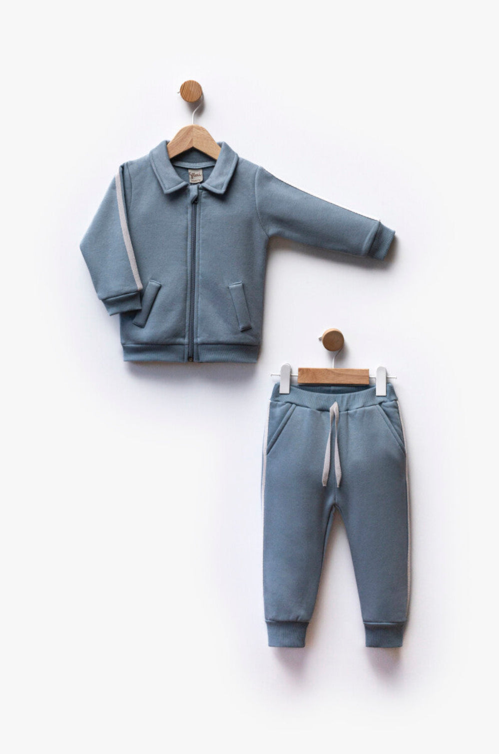 Toddler zip-up tracksuit set with collared jacket and matching joggers in neutral and blue – ages 1 to 5 years